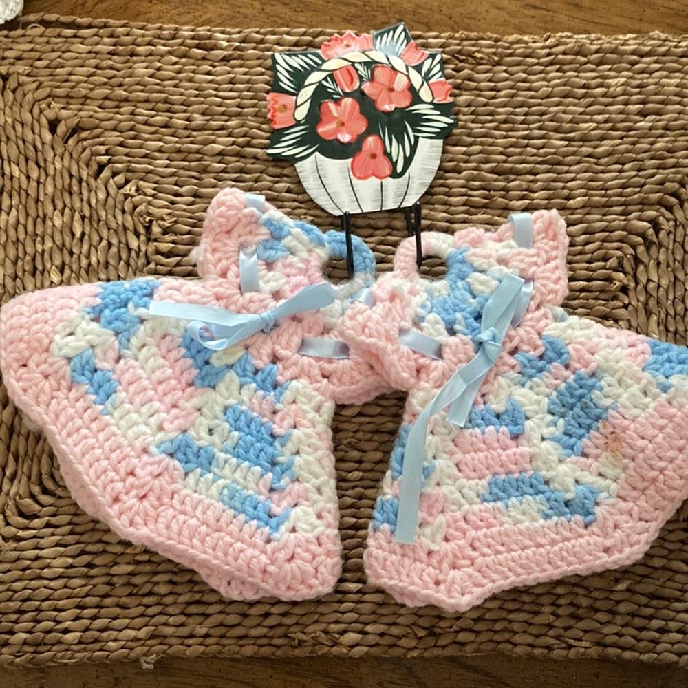 Two knitted potholders